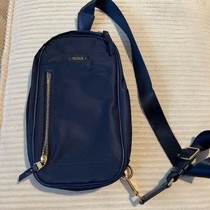 Small TUMI sling bag. Gently used.